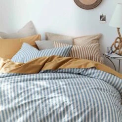 Warm Blue Seersucker Stripe Cotton Pillowcases (Pair) -Home Luxury Store Piglet in Bed Seersucker Stripe Bedding Warm Blue 7 9ac04081 d51f 422b b349 4f525addf68e