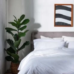 White Washed Cotton Percale Fitted Sheet -Home Luxury Store Piglet in Bed Washed Cotton Bedding White Lifestyle 1 f060f4a0 ec73 48ca 8c8c 38c3a338267d