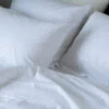 White Washed Cotton Percale Pillowcases (Pair) 1 White Washed Cotton Percale Pillowcases (Pair) -Home Luxury Store Piglet in Bed Washed Cotton Bedding White Lifestyle 5 f00a5c54 cf83 4be5 950b eeab762281bf