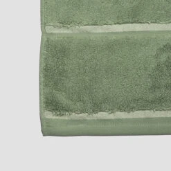 Meadow Green Hand Towel -Home Luxury Store PigletinBed BathroomCollection Detail MeadowGreen 1 greyBG e6810a38 286b 49ec 9f06 9765d0950a74