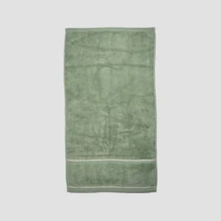 Meadow Green Hand Towel -Home Luxury Store PigletinBed BathroomCollection HandTowel MeadowGreen 2 greyBG 3bdaecd2 8bdb 421b a5cc a5116e3315ae