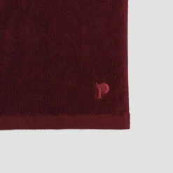 Merlot Organic Cotton Towels 8 Merlot Organic Cotton Towels -Home Luxury Store PigletinBed BathroomCollection OrganicCottonDetail Merlot 1 GreyBG f12743f0 d836 44ca 988b 3da71a3d671b