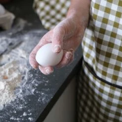 Botanical Green Gingham Linen Apron 11 Botanical Green Gingham Linen Apron -Home Luxury Store PigletinBed Kitchen LinenApron BotanicalGreen Lifestyle 2